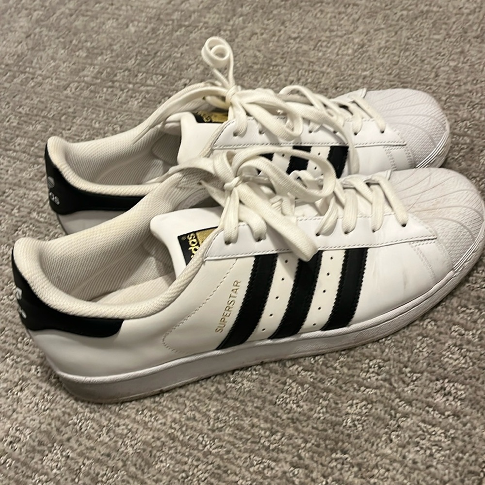 White adidas super stars. 10.5, barley worn
